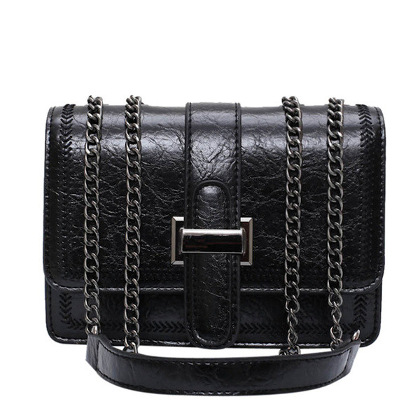 Női bőrtáska hosszú vas fogantyúval