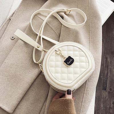 Stílusos női táska kerek formában - eko bőrből