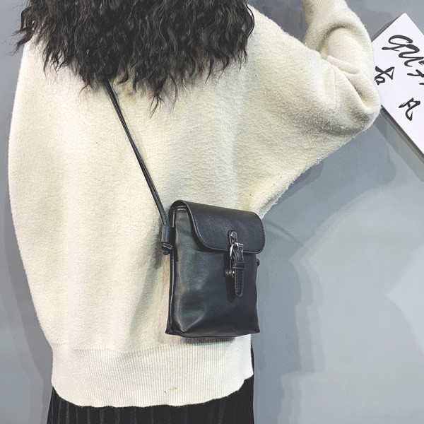 Alkalmi bőrtáska hosszú fogantyúval