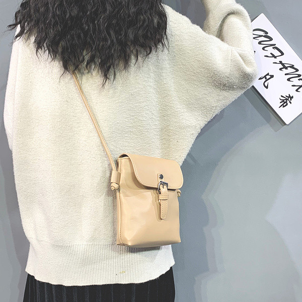 Alkalmi bőrtáska hosszú fogantyúval