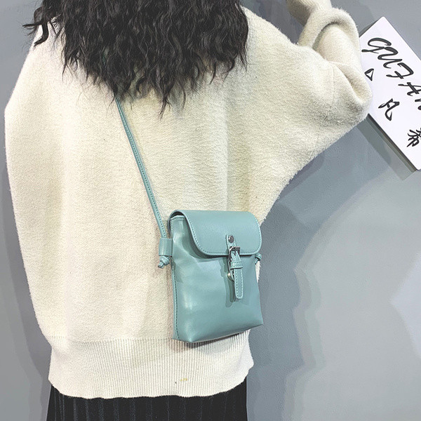 Alkalmi bőrtáska hosszú fogantyúval