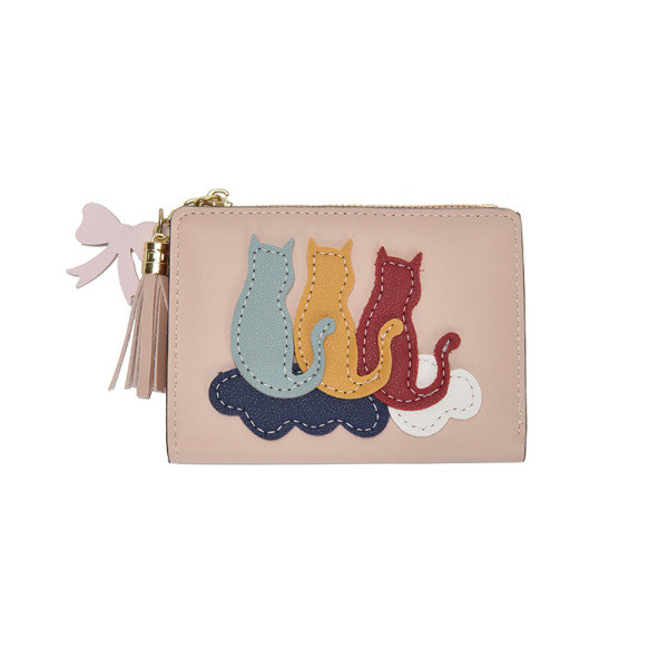 Kis pénztárca rátéttel és bojttal