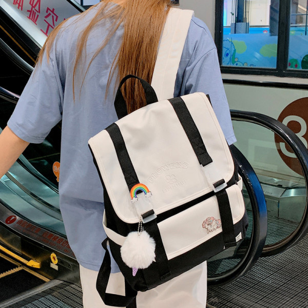 Moodne naiste seljakott värviliste laiade rihmadega