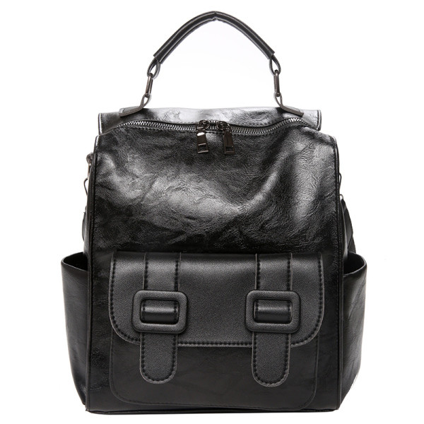 Női bőr hátizsák elülső zsebbel és rövid fogantyúval