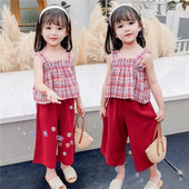 Modern gyerekgarnitúra széles nadrágból és kockás felsővel