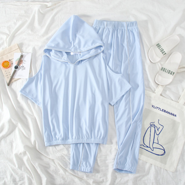 Sieviešu sporta komplekts no divām daļām ar kapuci un atkailinātiem pleciem