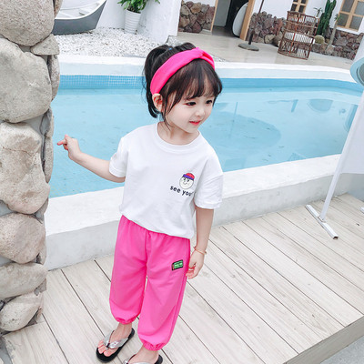 Gyerekkészlet hosszú nadrágból és blúzból, rövid ujjal és hímzéssel