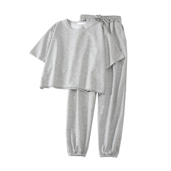 Naiste spordikomplekt kahest osast - T-särk ja elastse vöökohaga püksid