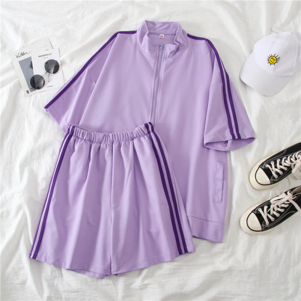 Kahest osast koosnev ääristusega naiste spordikomplekt