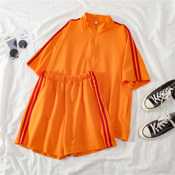 Kahest osast koosnev ääristusega naiste spordikomplekt