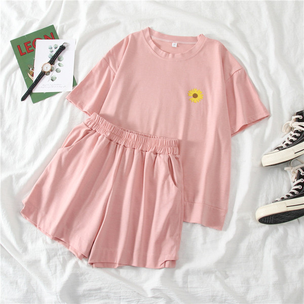 Sieviešu sporta komplekts no divām daļām ar aplikāciju