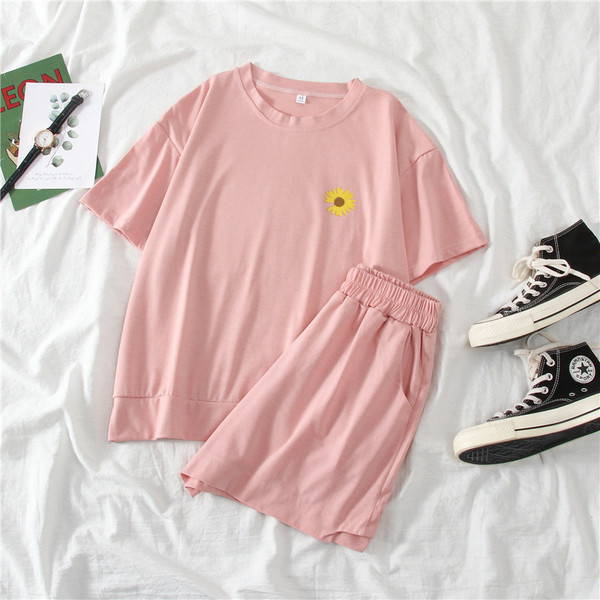 Sieviešu sporta komplekts no divām daļām ar aplikāciju