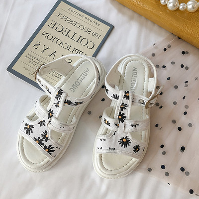 Alkalmi női szandál lapos talppal és virágmotívumokkal