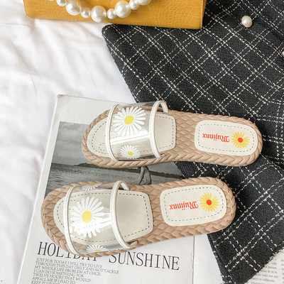 Alkalmi női papucs lapos talppal és rátéttel