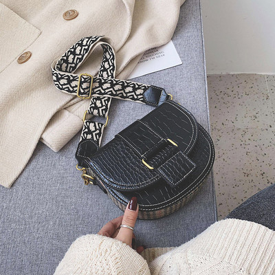 Laia värvilise käepidemega nahast naistekott