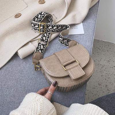 Laia värvilise käepidemega nahast naistekott