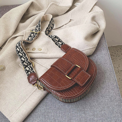 Laia värvilise käepidemega nahast naistekott