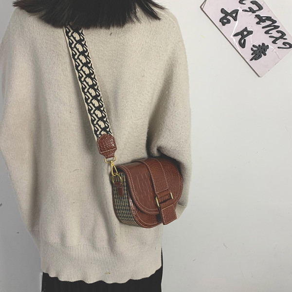 Laia värvilise käepidemega nahast naistekott