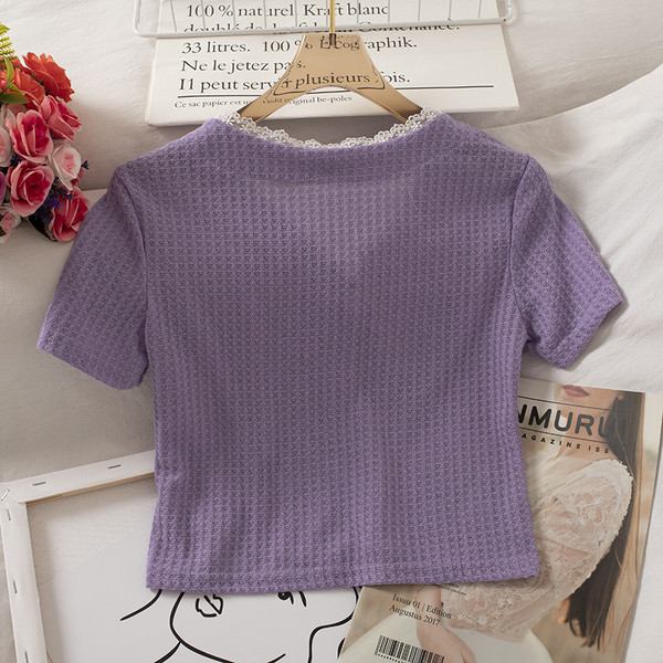 Alkalmi női ing rövid ujjal és V-nyakkal