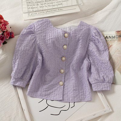 Lühike ümara kaeluse ja nööpidega naiste särk