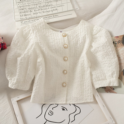 Lühike ümara kaeluse ja nööpidega naiste särk