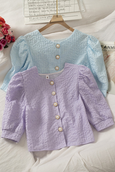 Lühike ümara kaeluse ja nööpidega naiste särk