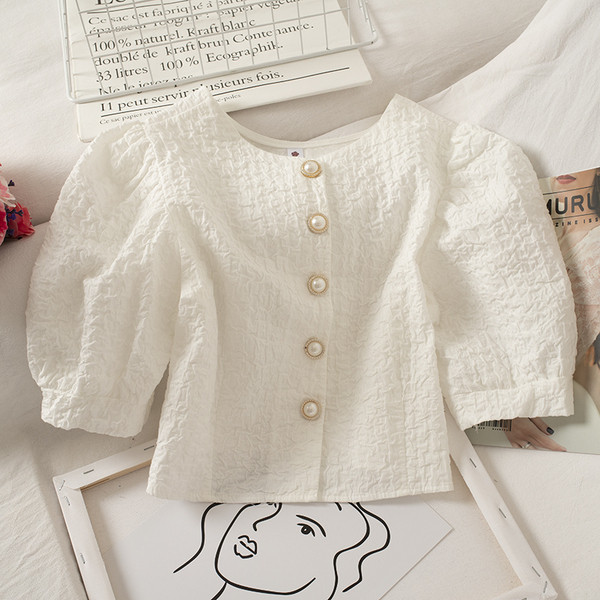 Lühike ümara kaeluse ja nööpidega naiste särk