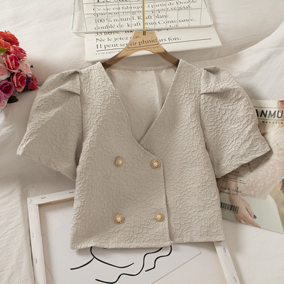 Modern női ing rövid ujjal és spitz nyakkivágással