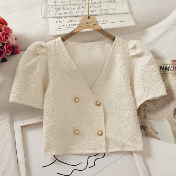 Modern női ing rövid ujjal és spitz nyakkivágással