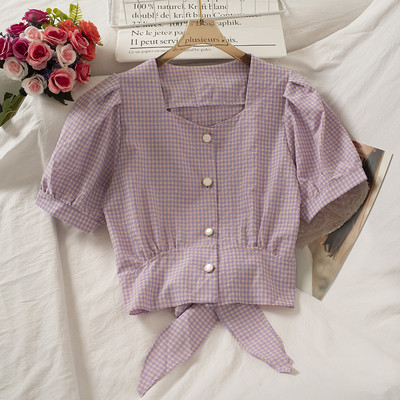 Ruuduline naiste särk kandilise kaelusega ja lipsudega