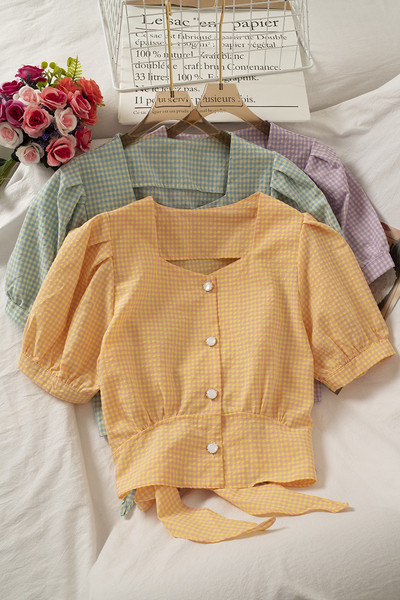 Ruuduline naiste särk kandilise kaelusega ja lipsudega