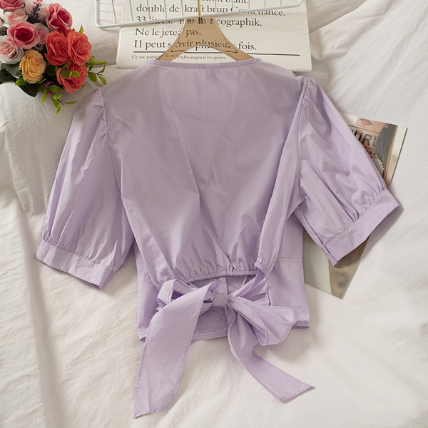 Női ing fűzővel és V-nyakkal