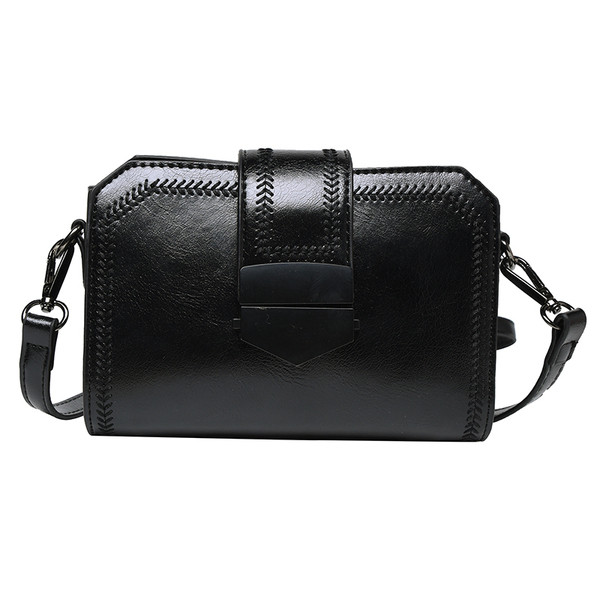 Női bőr kis táska hosszú füllel