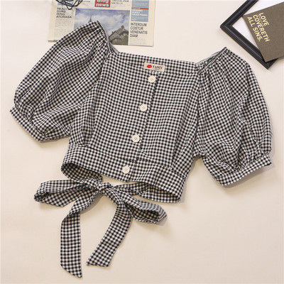 Kockás női ing nyakkendővel és széles ujjakkal