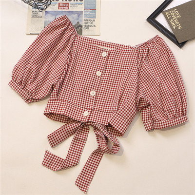 Kockás női ing nyakkendővel és széles ujjakkal