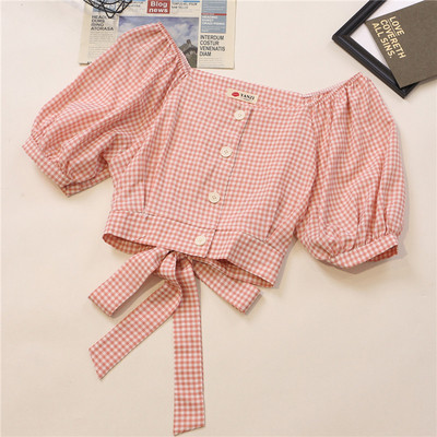 Kockás női ing nyakkendővel és széles ujjakkal