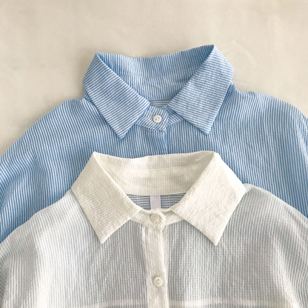 Alkalmi női ing széles modell hosszú ujjal