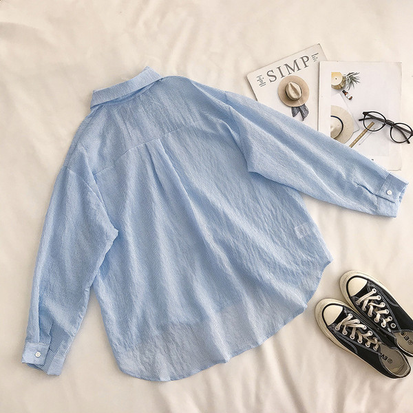 Alkalmi női ing széles modell hosszú ujjal