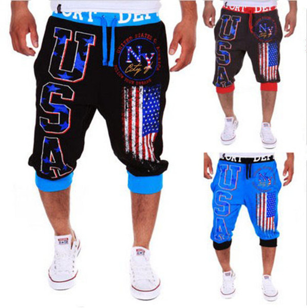 Meeste vabaaja püksid 7/8 pikkust kirjadega