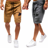 Meeste jooksvad lühikesed püksid 3/4 pikkusega lipsudega