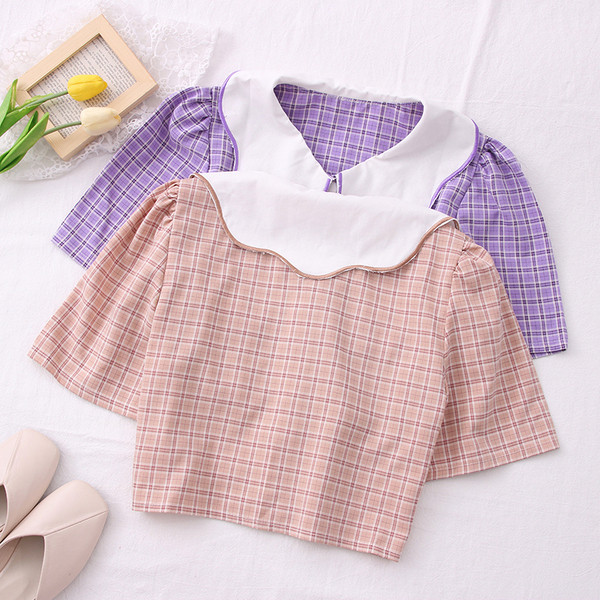 Új modell női rövid ing gombokkal és spitz nyakkivágással