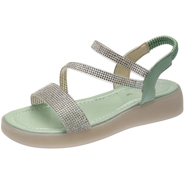 Aktuális női szandál lapos talppal és kövekkel