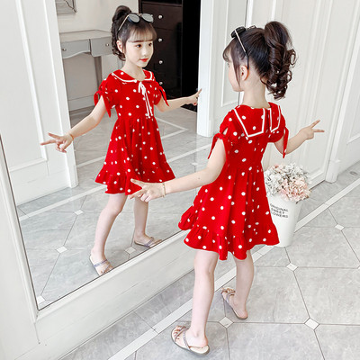 Piros pöttyös gyerekruha szalagokkal