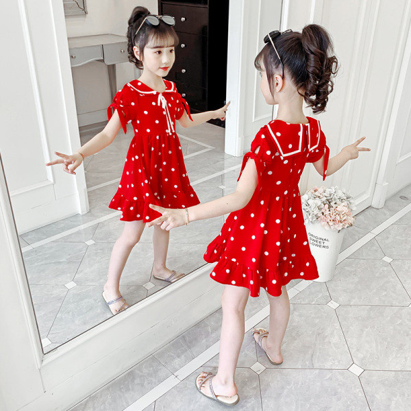 Piros pöttyös gyerekruha szalagokkal