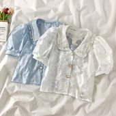 Moderns sieviešu krekls ar mežģīnēm un pērlēm