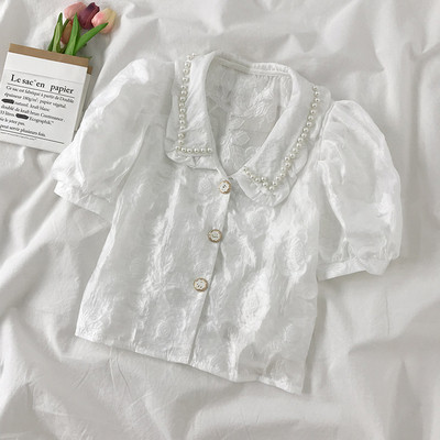 Moderns sieviešu krekls ar mežģīnēm un pērlēm