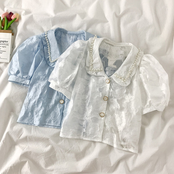 Moderns sieviešu krekls ar mežģīnēm un pērlēm