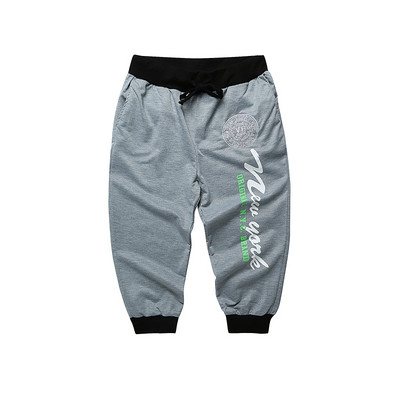 Férfi alkalmi sportnadrág 7/8 hosszúságú feliratokkal