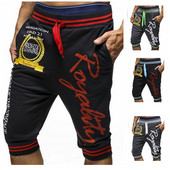 Meeste vabaaja püksid pikkusega 7/8 kirjadega