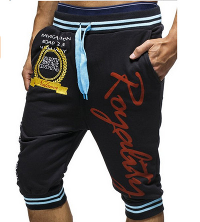 Meeste vabaaja püksid pikkusega 7/8 kirjadega